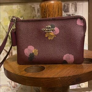 Coach Wristlet with Floral Accents - Burgundy and Pink